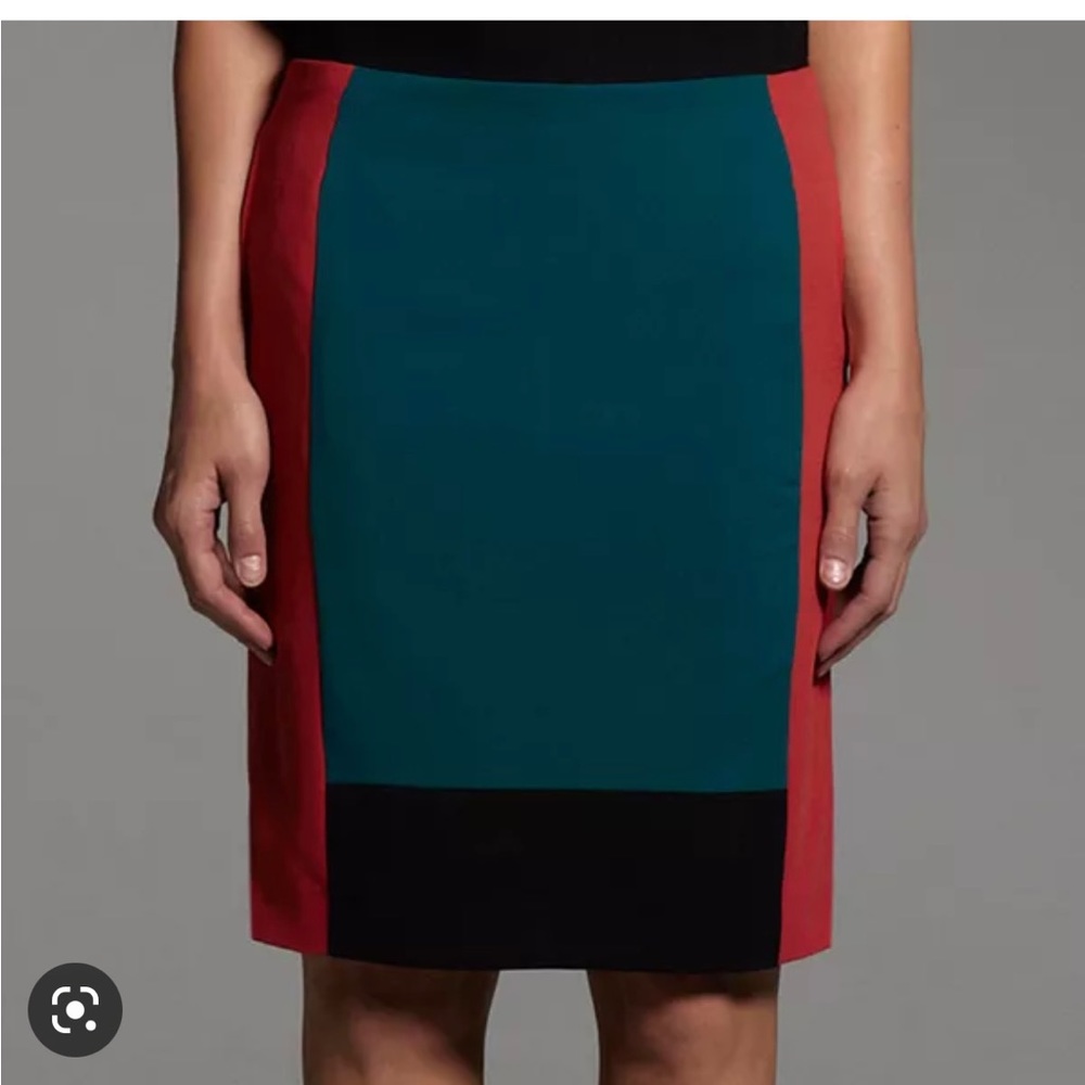 Colorblock skirt with full zipper back and slip. Classy and comfy skirt.